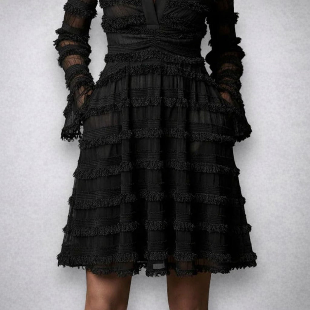 Parisa – Vestido midi con flecos transparentes